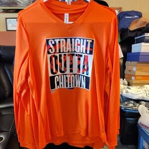 Vibrant Orange Long Sleeve Tee with Graphic Print